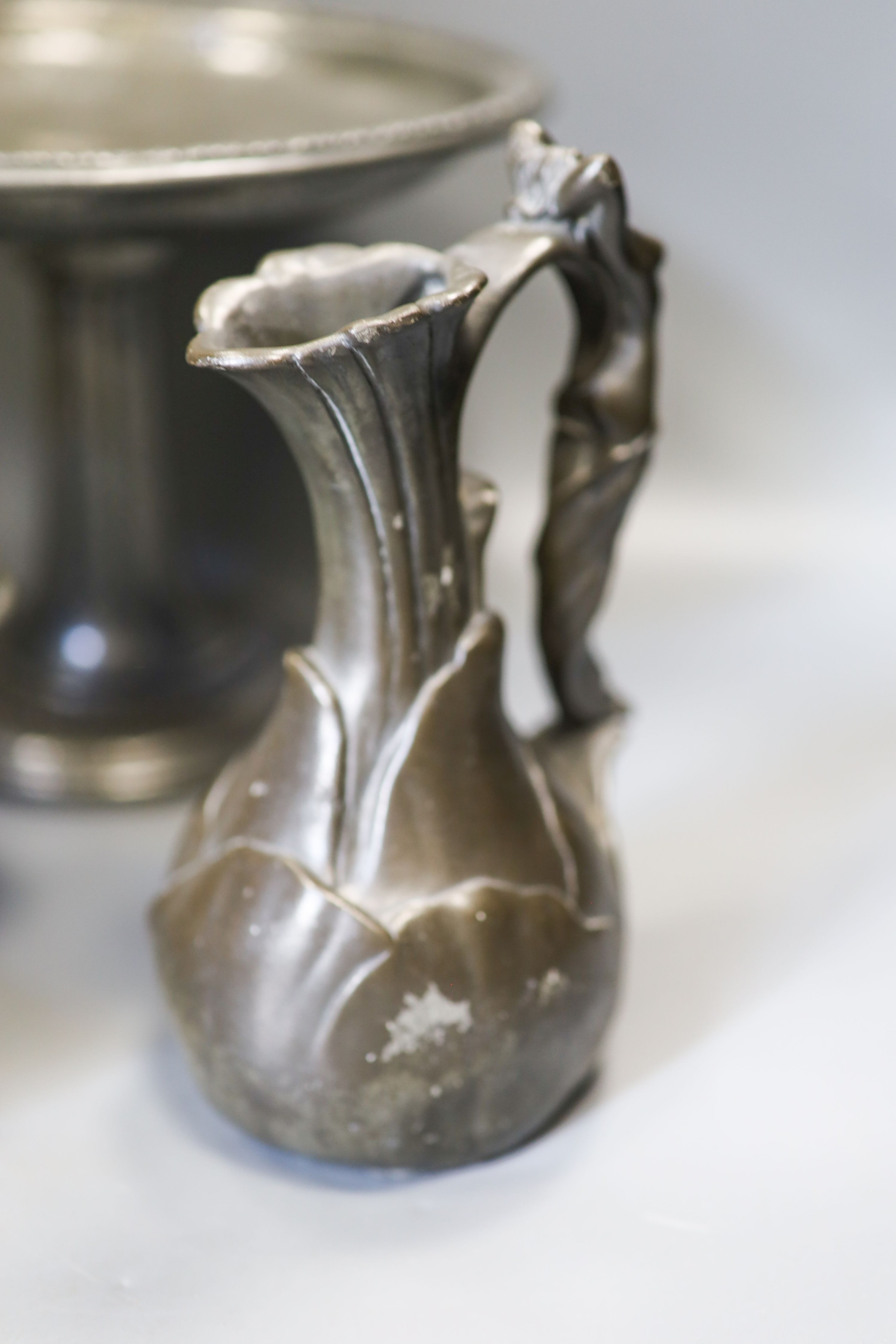 J Garnier - cast pewter jug in Art Nouveau style, Two Liberty's Tudric hammered pewter items and two other pewter wares